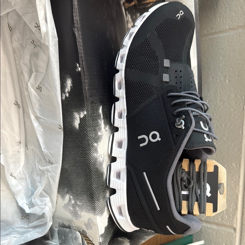 On Running Women’s Black and White Athletic Shoes